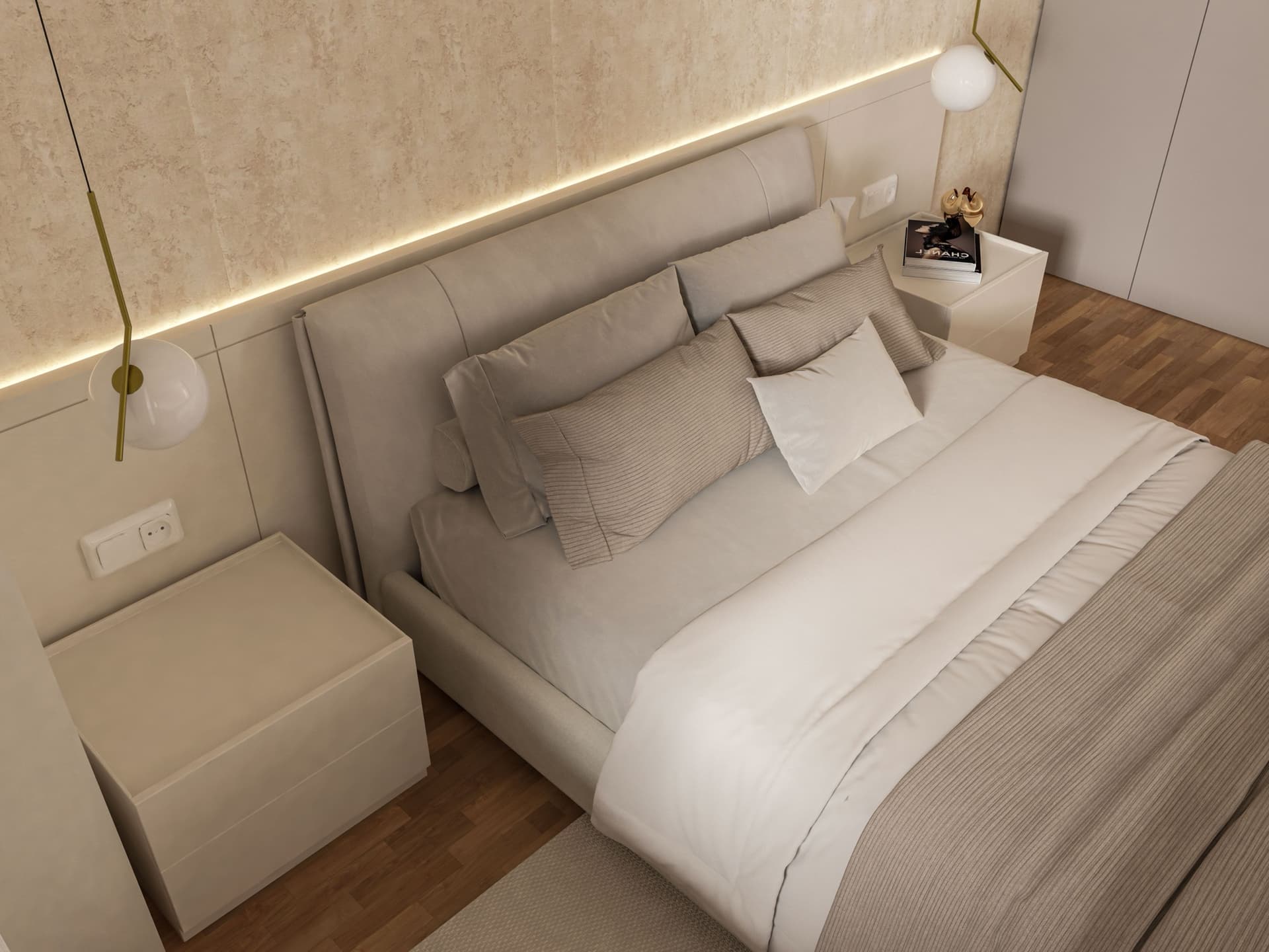 A made bed with an upholstered headboard